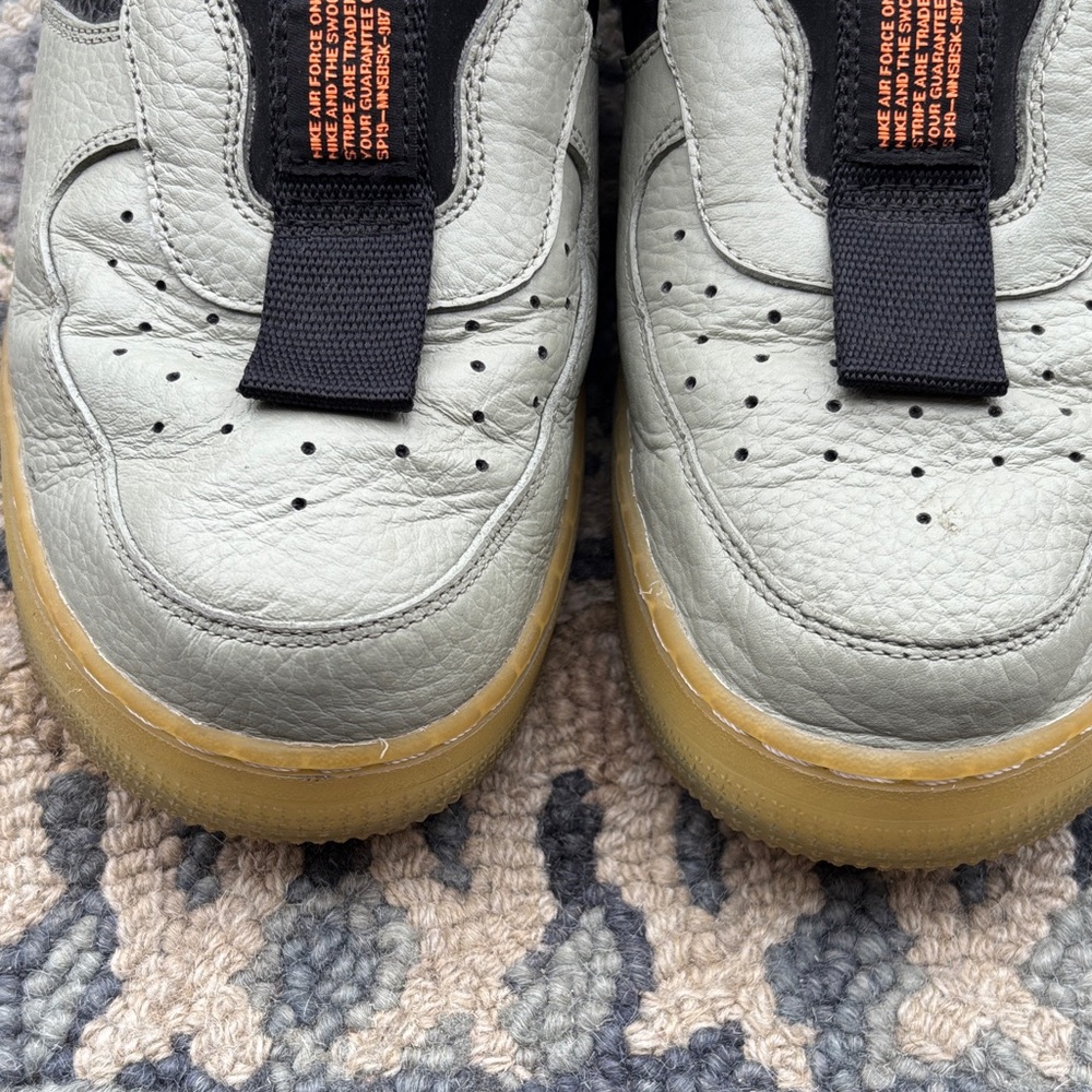 Stylish High-Top Sneakers with Orange Accents - Picture 6 of 6